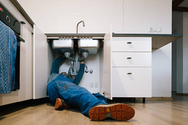 Professional Emergency Plumber technician working in Cortland, IL